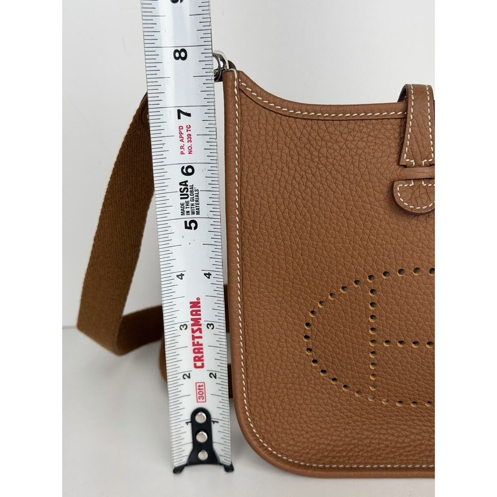 Hermes Evelyne TPM 16 Crossbody Bag in Gold Taurillon Clemence Leather 2024 D7 - Picture 12 of 13